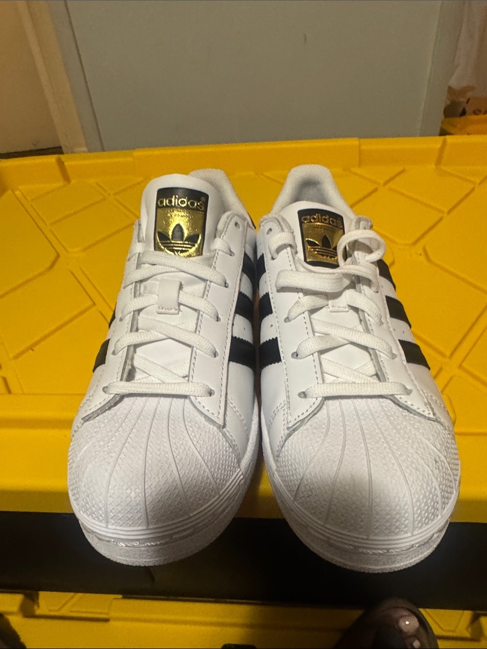 adidas Kids White Sneakers with Black Stripes and Gold Tongue Logo